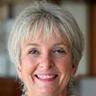 Susan M., 58, smiling