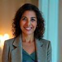 Portrait of Maria Rodriguez, Sleep Optimization Expert for Verdant Bloom Collective.