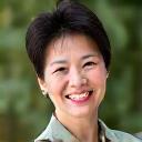 Professional headshot of Ella Chen, Certified Holistic Wellness Coach.