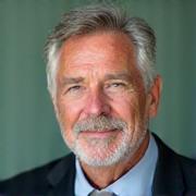 Professional headshot of Dr. Marcus Thorne, an experienced holistic sleep expert.